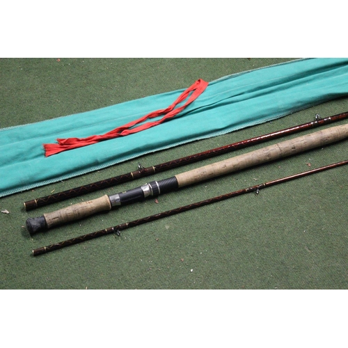 341 - A cased 3 piece Shakespeare Salmon 14ft fishing rod.