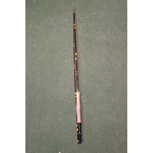 342 - A 2 piece carbon fly fishing rod.