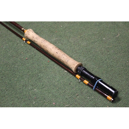 342 - A 2 piece carbon fly fishing rod.