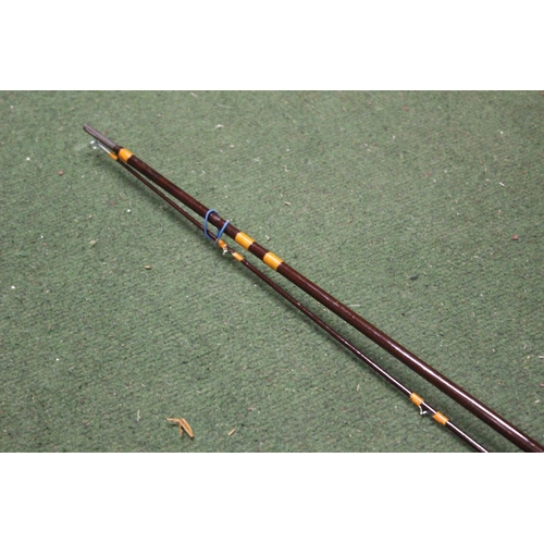 342 - A 2 piece carbon fly fishing rod.