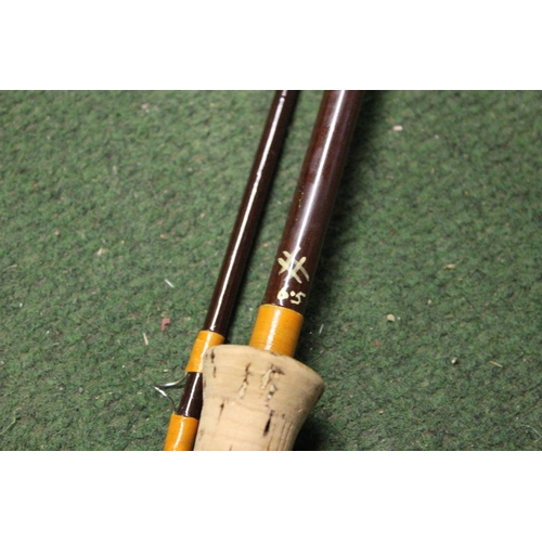 342 - A 2 piece carbon fly fishing rod.