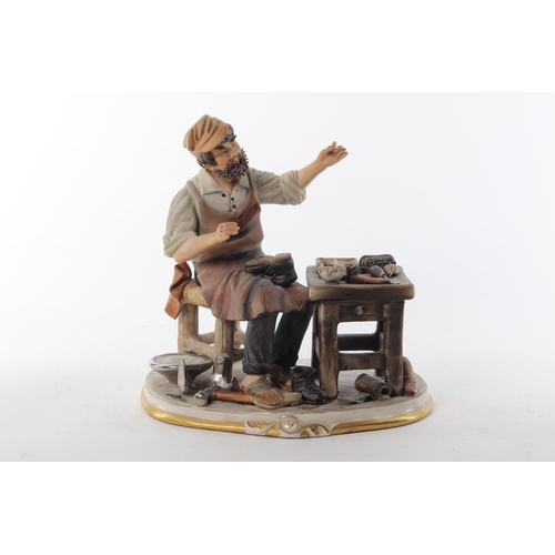 368 - A Capodimonte style figure, 'The Cobbler'. Approx 24x23cm.