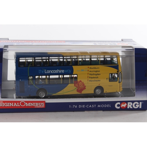 374 - 2 boxed Corgi model buses.