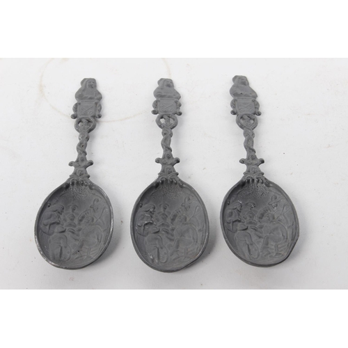 390 - 3 decorative antique pewter spoons.