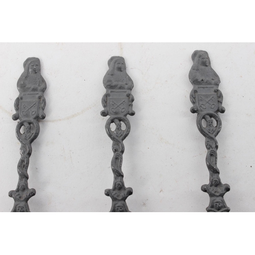 390 - 3 decorative antique pewter spoons.