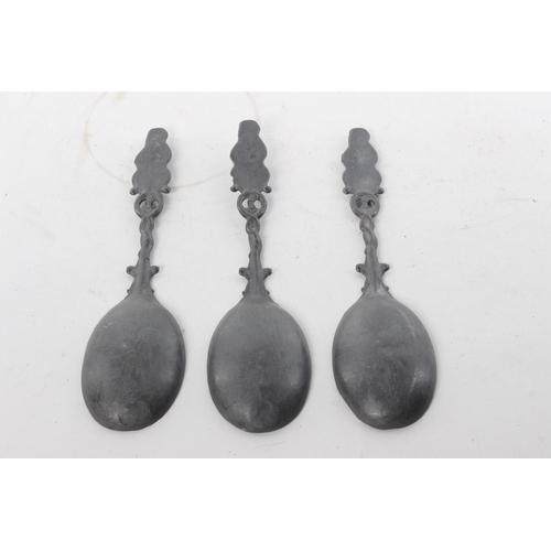 390 - 3 decorative antique pewter spoons.