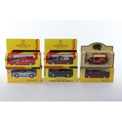 394 - A collection of 6 boxed model cars.