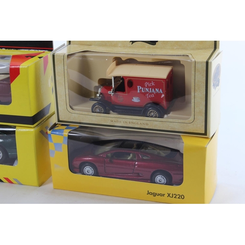 394 - A collection of 6 boxed model cars.