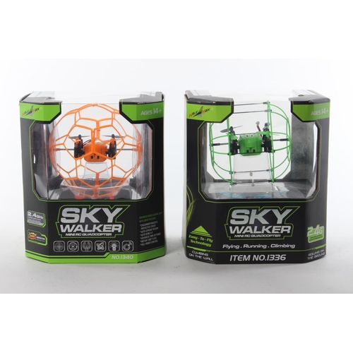 404 - 2 boxed Remote Control Sky Walkers.