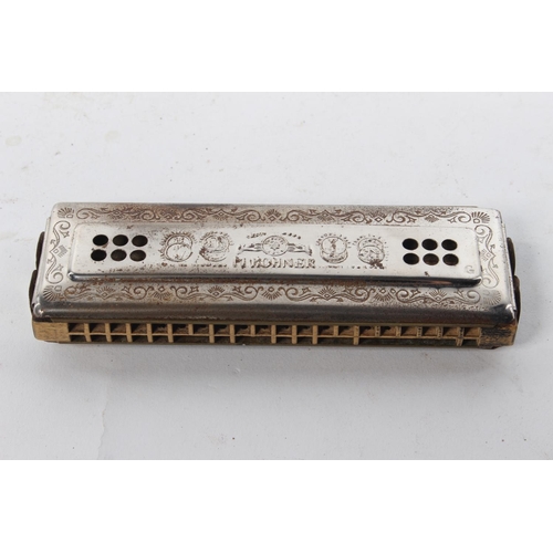 405 - A vintage Hohner Echo harmonica.