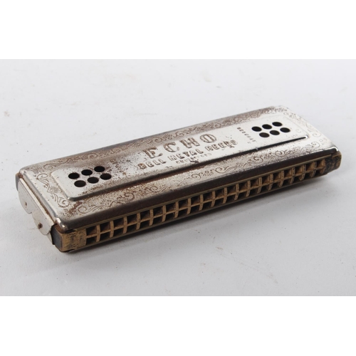 405 - A vintage Hohner Echo harmonica.