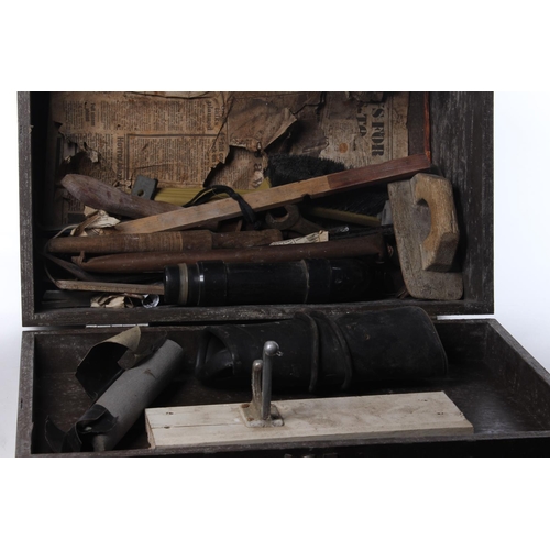 413 - A vintage wooden toolbox with contents.