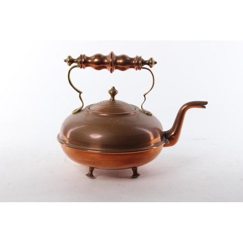 438 - A vintage copper kettle.