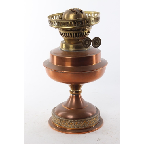 448 - A vintage copper & brass oil lamp base.