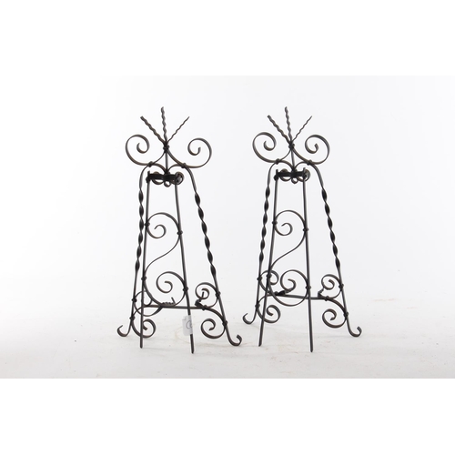 449 - A pair of handmade wrought metal table top easels.