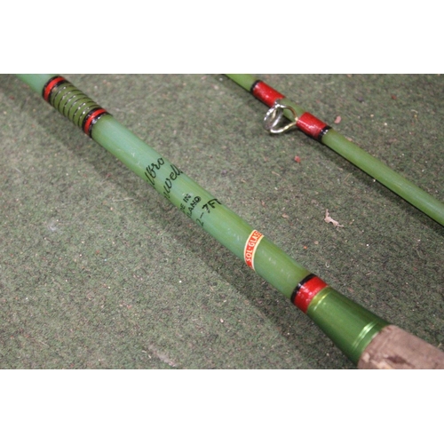 452 - A cased Milbro 2 piece fishing rod.