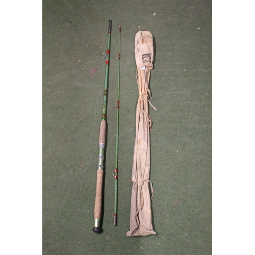 452 - A cased Milbro 2 piece fishing rod.