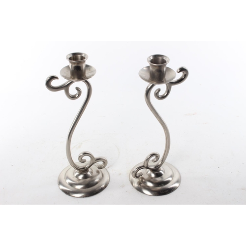 461 - A pair of decorative candlesticks.