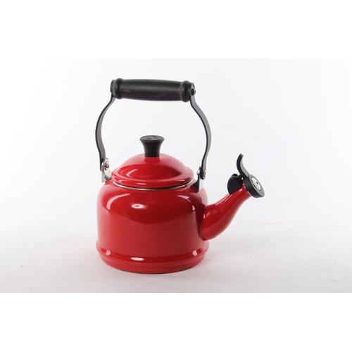 463 - A L Creuset red kettle.