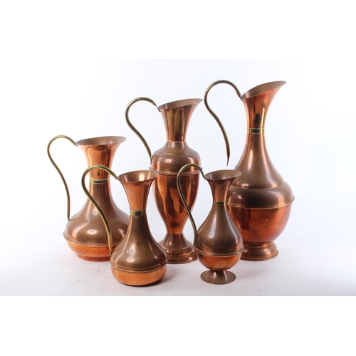 477 - 5 vintage copper & brass jugs.