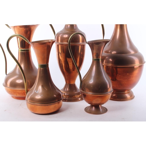 477 - 5 vintage copper & brass jugs.