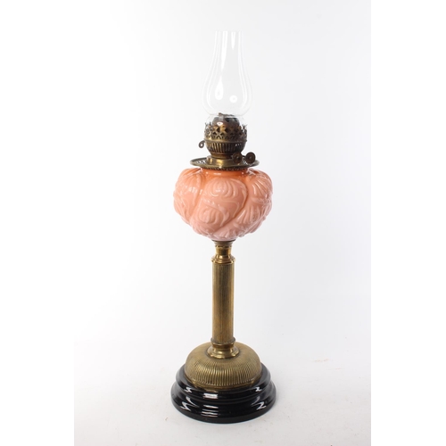 478 - A stunning antique oil lamp with decorative coloured glass bowl.