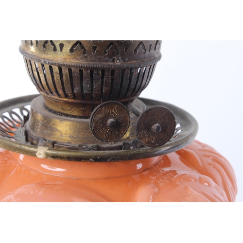 478 - A stunning antique oil lamp with decorative coloured glass bowl.