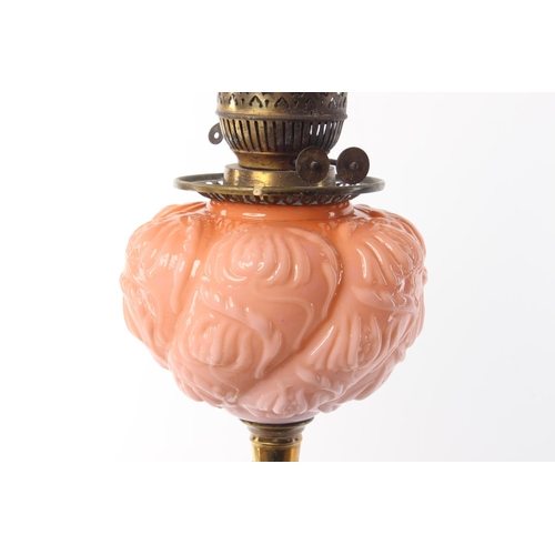 478 - A stunning antique oil lamp with decorative coloured glass bowl.