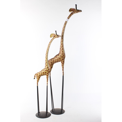 479 - 2 metal giraffes.