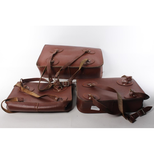 489 - 3 leather satchels.