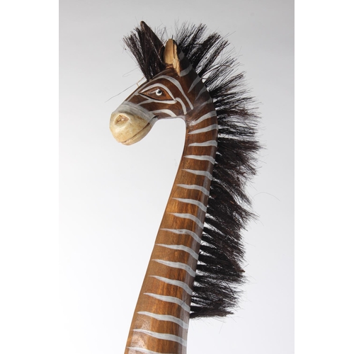 497 - A large wooden zebra. Approx 100cm.