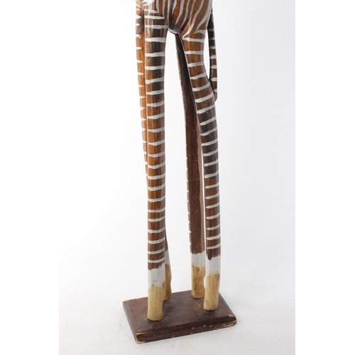 497 - A large wooden zebra. Approx 100cm.