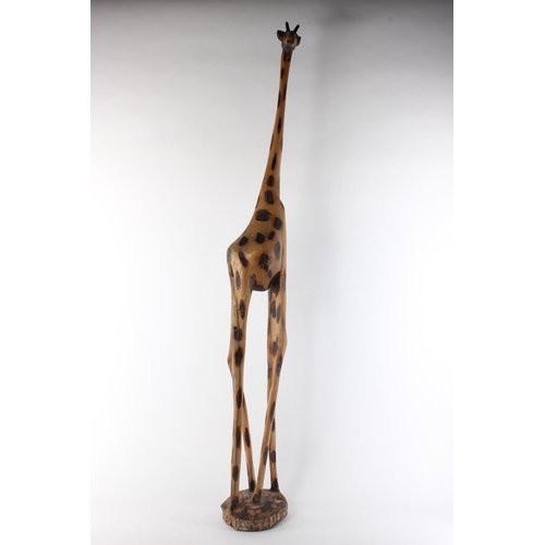 498 - A large wooden giraffe. Approx 115cm.