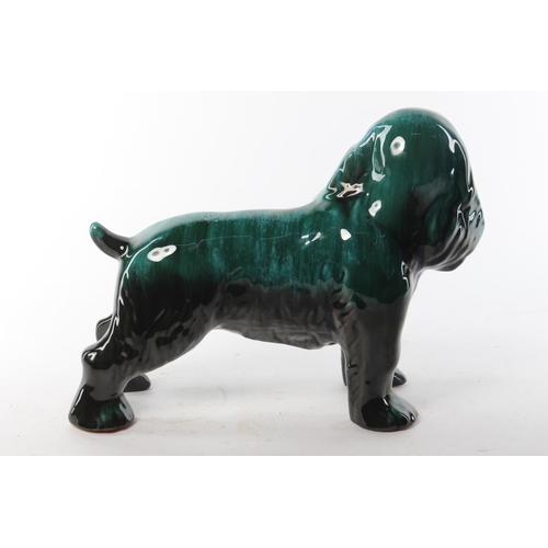 503 - A large Blue Mountain Pottery spaniel. Approx 34x28cm