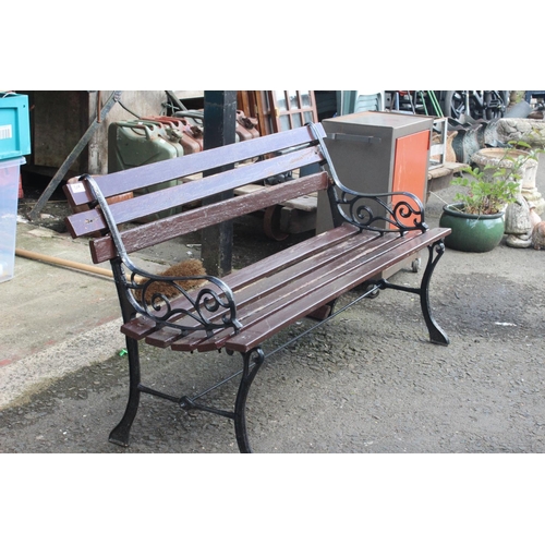 508 - A garden bench with cast iron ends.