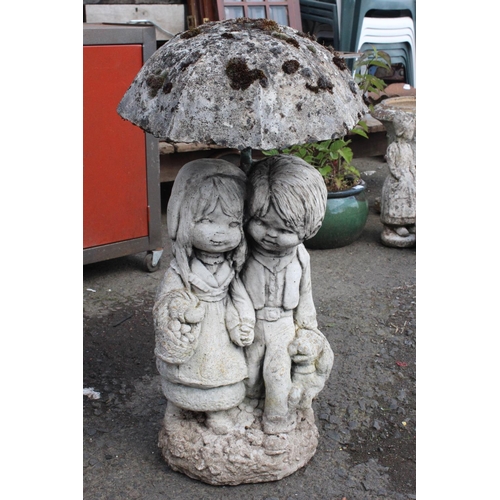 509 - A large decorative concrete garden statue.