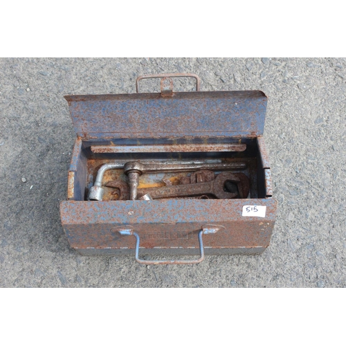 515 - A vintage metal toolbox with contents.