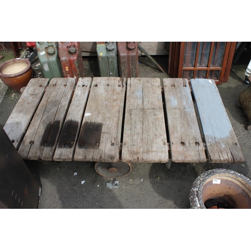 517 - An antique Slingsbury wooden cart with cast iron wheels, used for tannery for leatherworking and hid... 