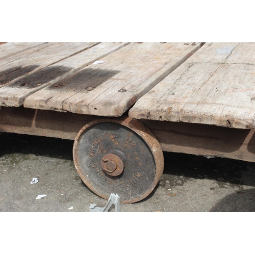 517 - An antique Slingsbury wooden cart with cast iron wheels, used for tannery for leatherworking and hid... 