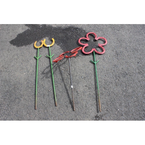 535 - 4 handmade garden decorations, made from old horseshoes.