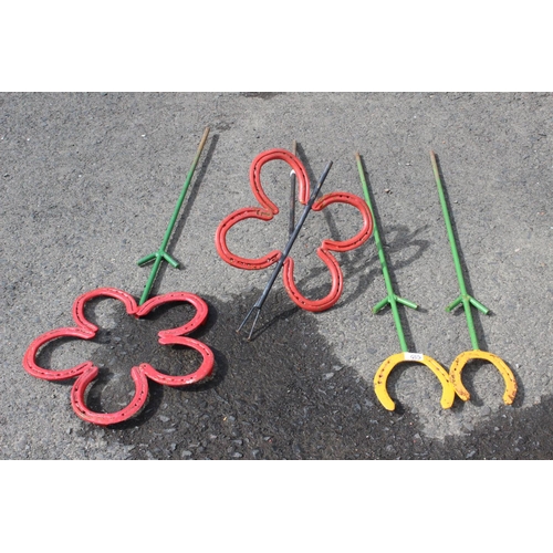 535 - 4 handmade garden decorations, made from old horseshoes.