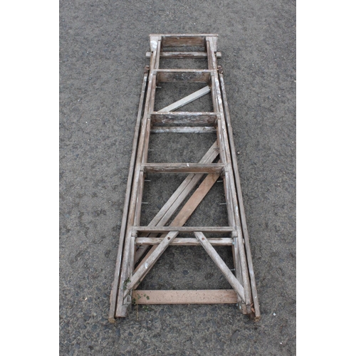 556 - A vintage wooden stepladder.