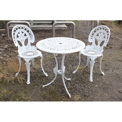 565 - A cast metal garden set, to include table & pair of chairs.