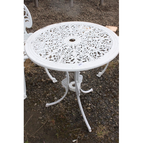 565 - A cast metal garden set, to include table & pair of chairs.