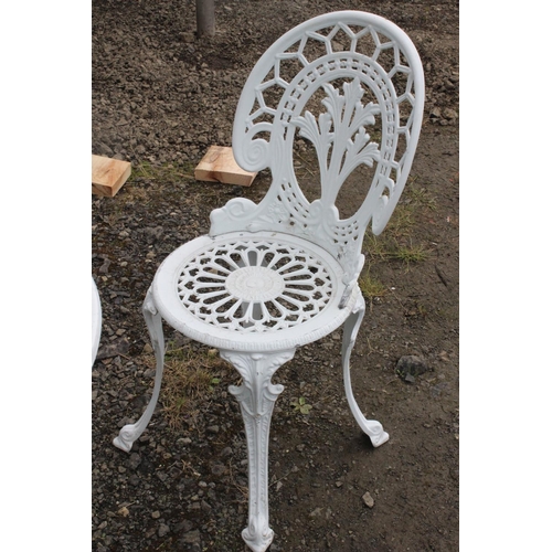 565 - A cast metal garden set, to include table & pair of chairs.