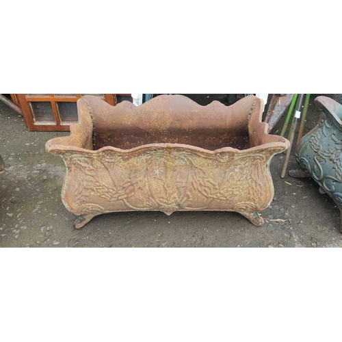 534 - A large antique cast iron garden planter.