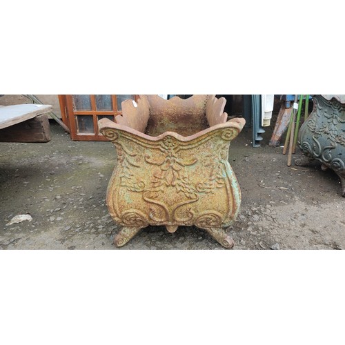 534 - A large antique cast iron garden planter.