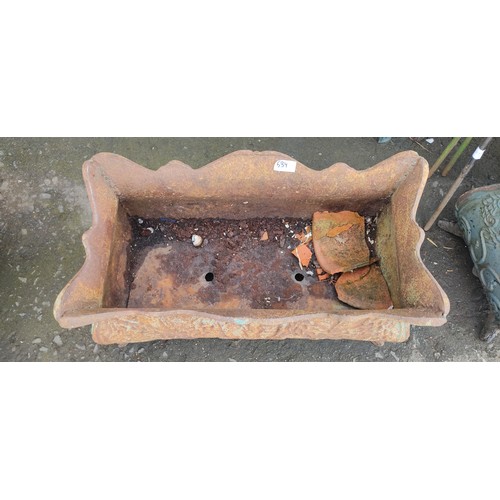 534 - A large antique cast iron garden planter.