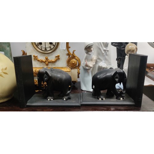 393 - A pair of wooden elephant bookends.