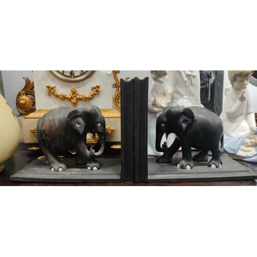 393 - A pair of wooden elephant bookends.